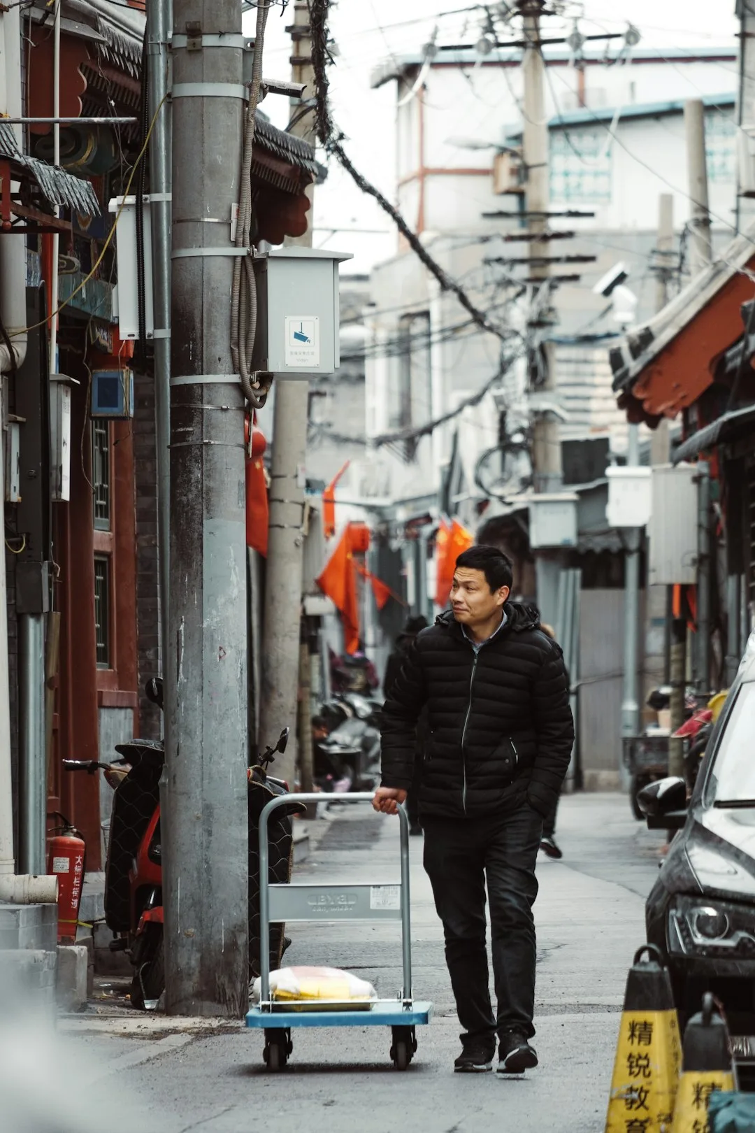 Traditional Beijing hutong lane with historic courtyard architecture
