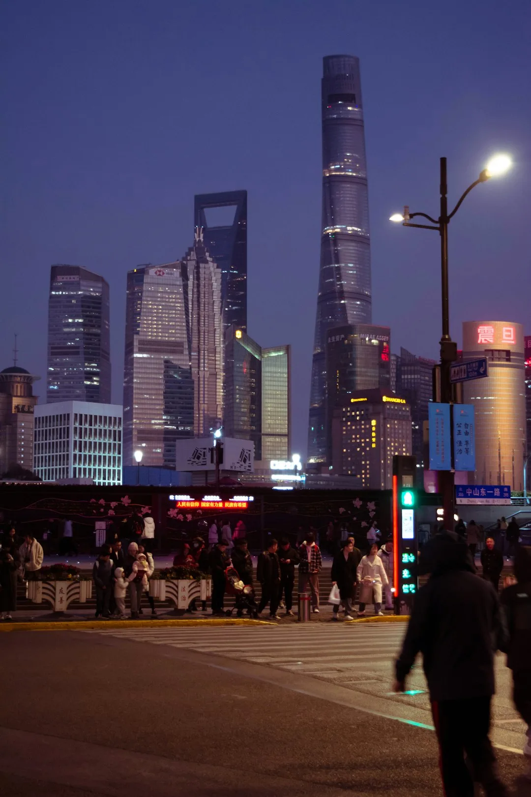 Evening lights and pedestrians on Shanghai’s Nanjing Road