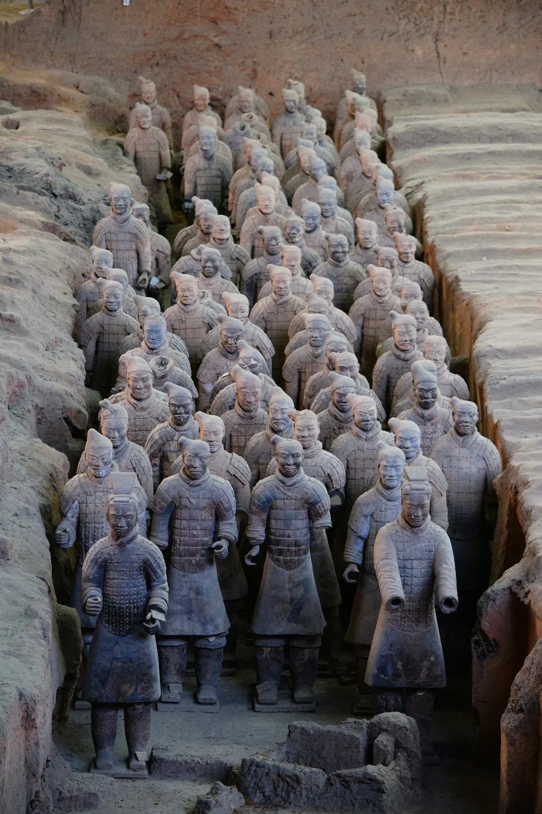 Rows of Terracotta Warriors inside the archaeological excavation hall near Xi’an