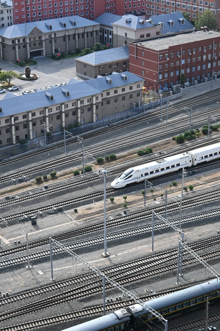 High-speed train travelling on railway tracks in China